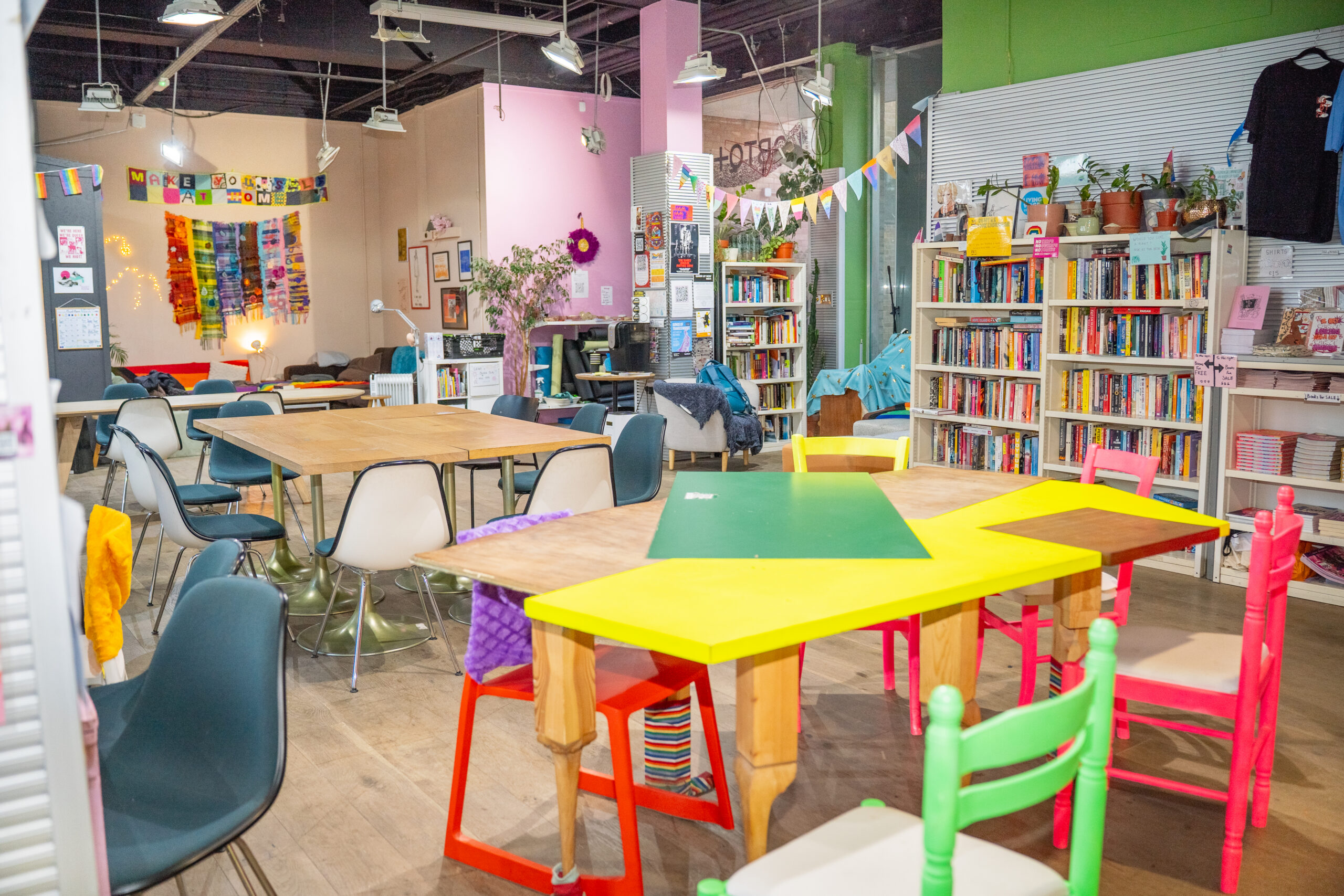 Tables and chairs in the main space at the London LGBTQ+ Community Centre.